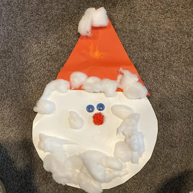 Paper plate Santa craft with cotton ball beard and red paper hat