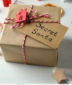 Small gift wrapped in kraft paper with twine