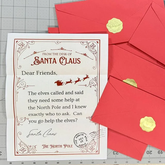 Printable letter from Santa Claus with red envelopes and gold seals