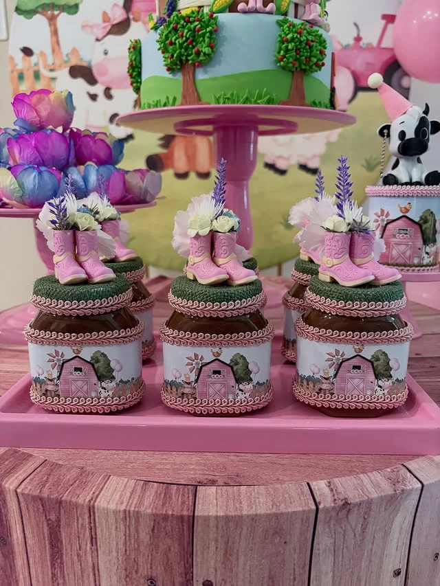 Pink farm dessert jars with cowboy boot toppers