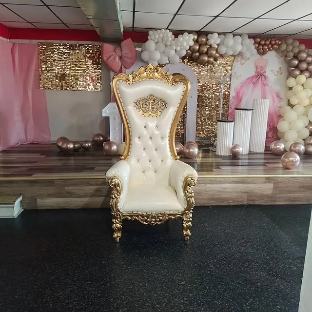Ornate throne style armchair on a stage for a celebration
