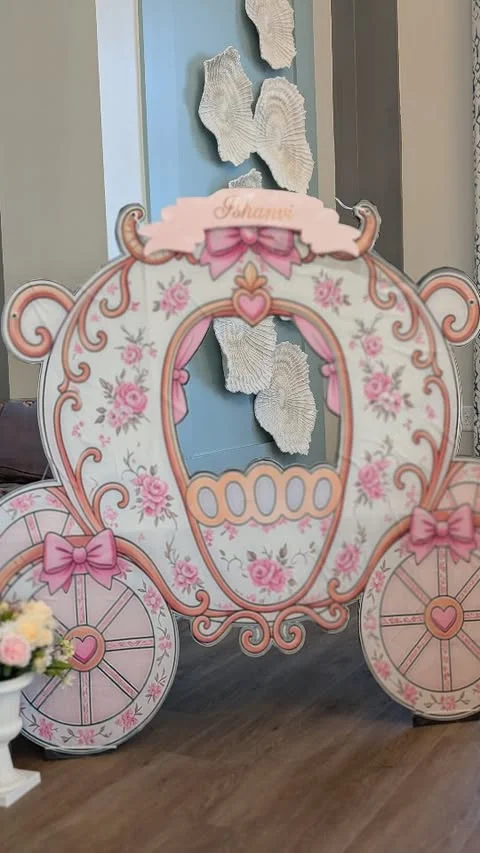 Pink Cinderella style pumpkin carriage photo booth prop