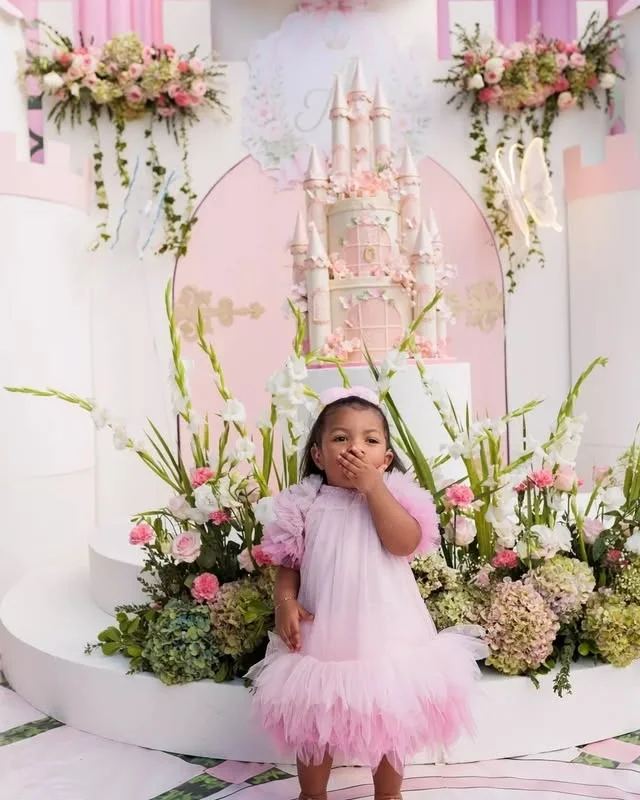 Young girl wearing a pink tulle princess dress