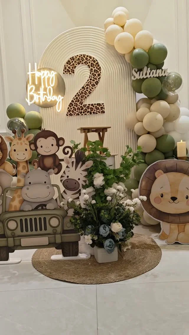 Safari jeep photo backdrop with monkey lion and zebra cutouts